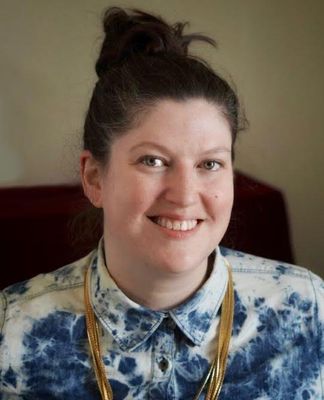 Portrait of Lillian Kology, Office Administrator,  RE Salesperson.